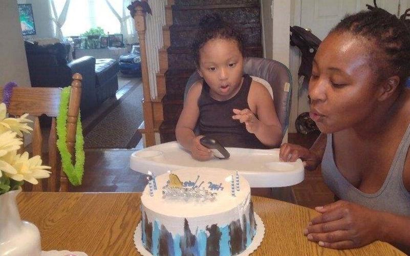 SYDNEY THOMAS WITH SON MASON edit.jpg