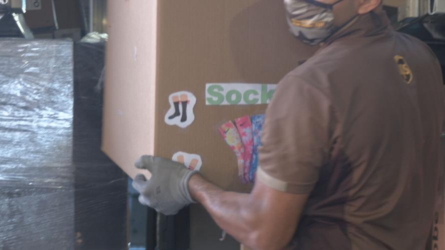 UPS delivers 19,000 pairs of socks to Wayside Christian Mission on Feb. 10, 2022