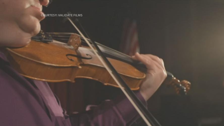 MICHAEL CLEVELAND GRAMMY WIN 5pPKG.transfer_frame_5687 violin close-up.jpg