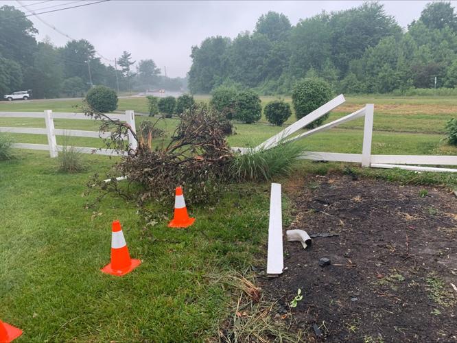 A fence police say shooting victim drove through before crashed his car into pool on June 6, 2023