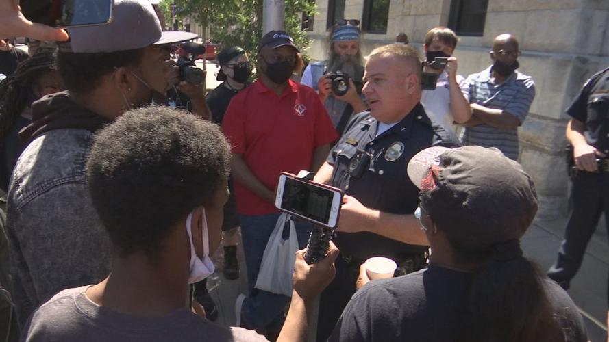 Acting LMPD chief talks with protesters downtown Monday