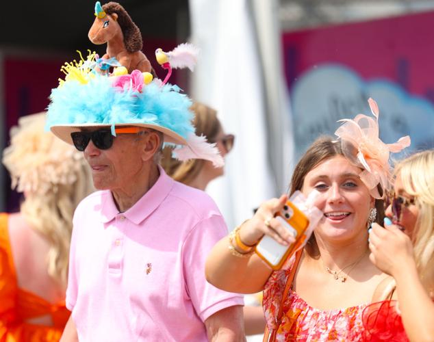 Man with horse hat and girl.JPG