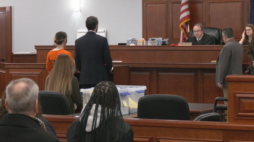 Tiffanie Lucas walks toward the podium to face Judge Rodney Burress inside a Bullitt County courtroom on Jan. 8, 2024 for a status hearing. (WDRB photo)
