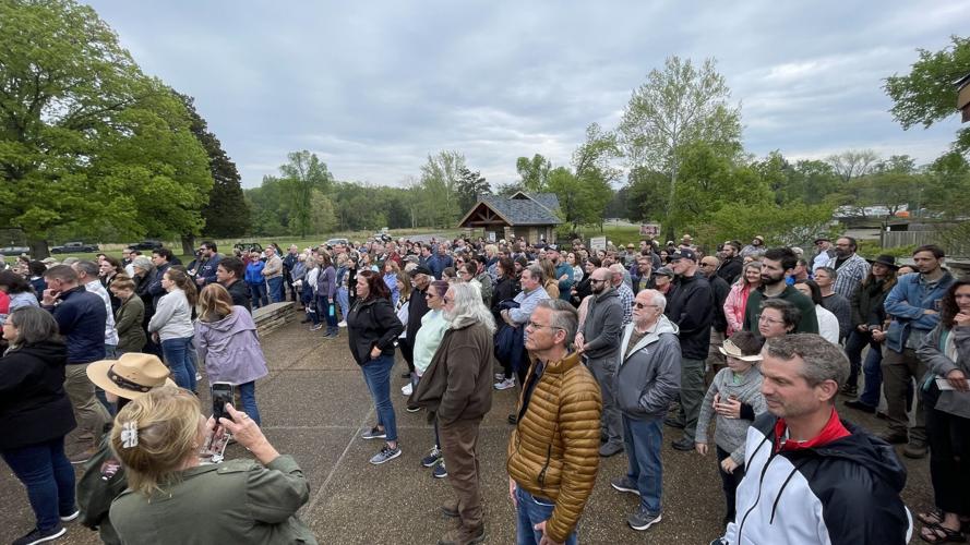 People wait at Mammoth Cave for concert