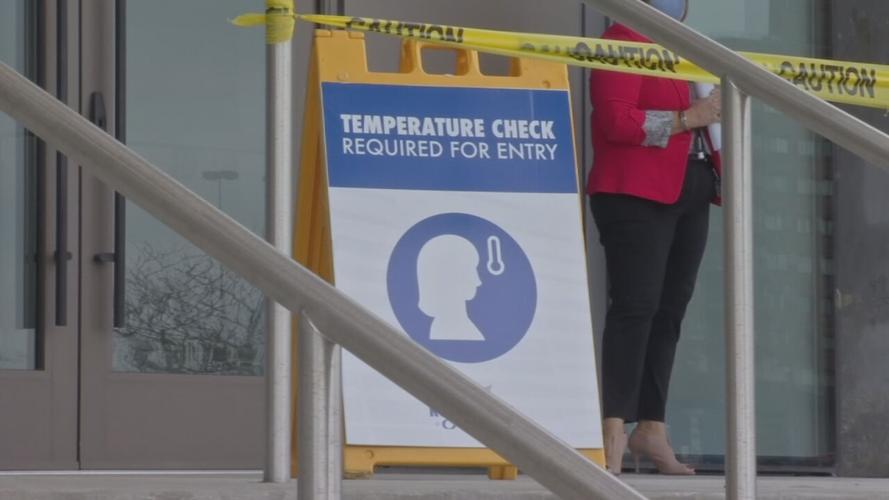 Rupp Arena temp check sign