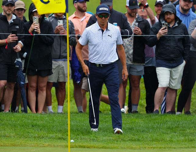 Rickie Fowler approaches a chip shot.JPG