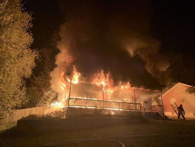 Flames from fire at home on Greenup Road