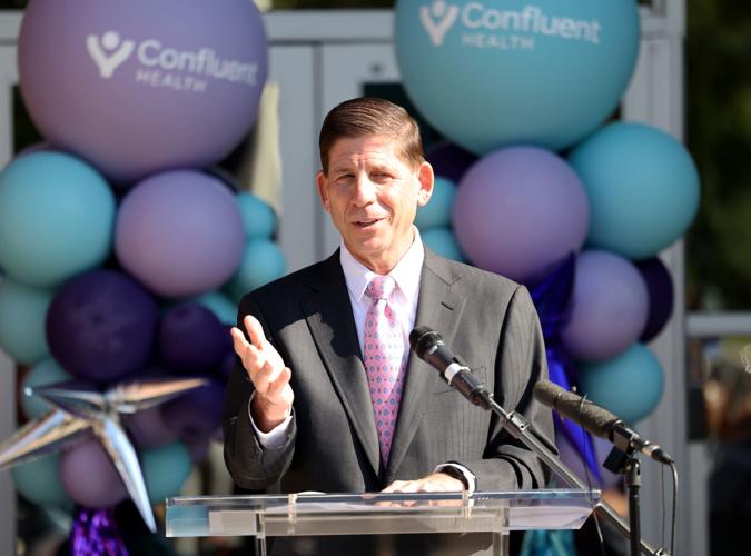 Dr. Larry Benz speaks at ribbon cutting ceremony