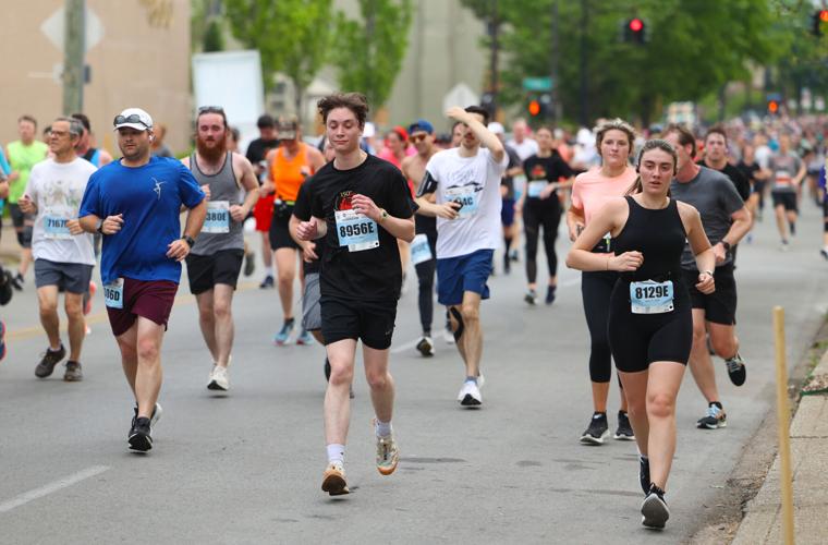People continue to run at Marathon.JPG
