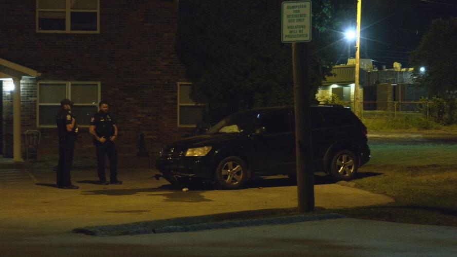 LMPD next to abandoned car after Alpha Gun Store break-in