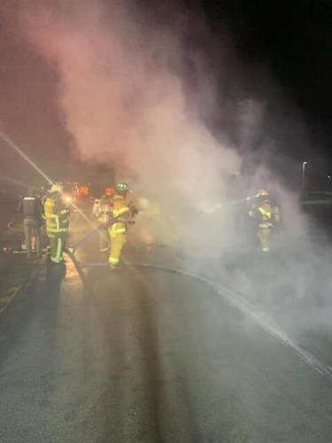 Semi with girl scout cookies on fire.jpg