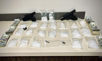 Confiscated drugs, guns and cash