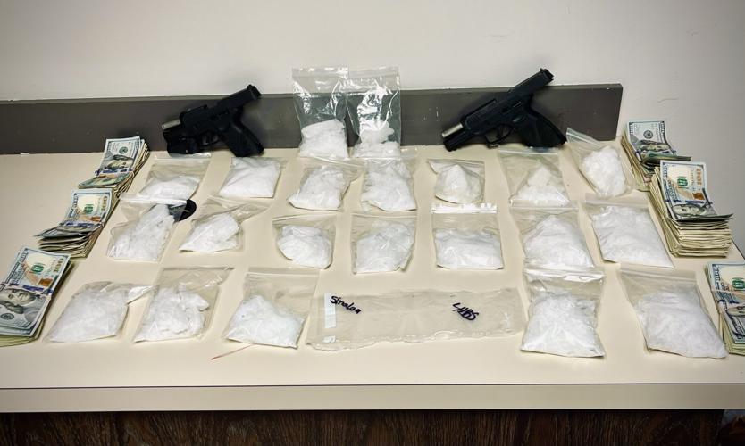 Confiscated drugs, guns and cash