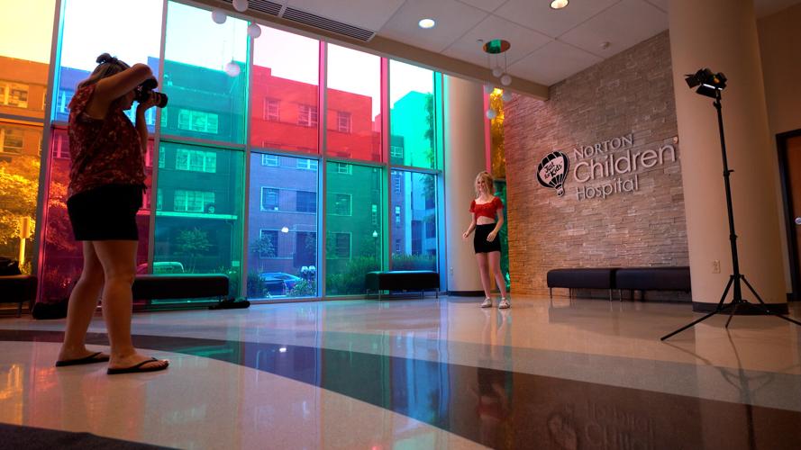 Kennedy Moore, a CAL student, gets senior pictures taken at Norton Children's Hospital