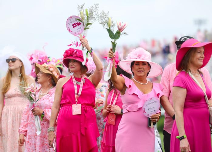 Survivors wave to crowd on Kentucky Oaks Day.JPG