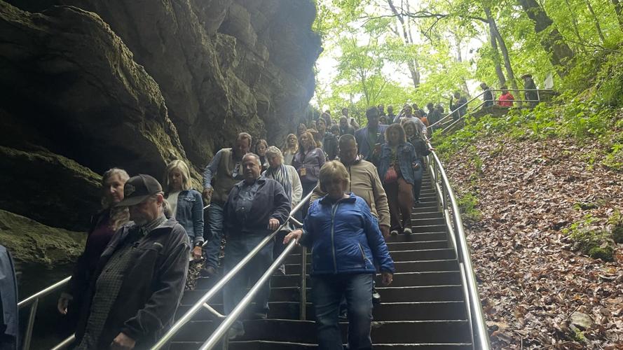People walk down steps in Mammoth Cave
