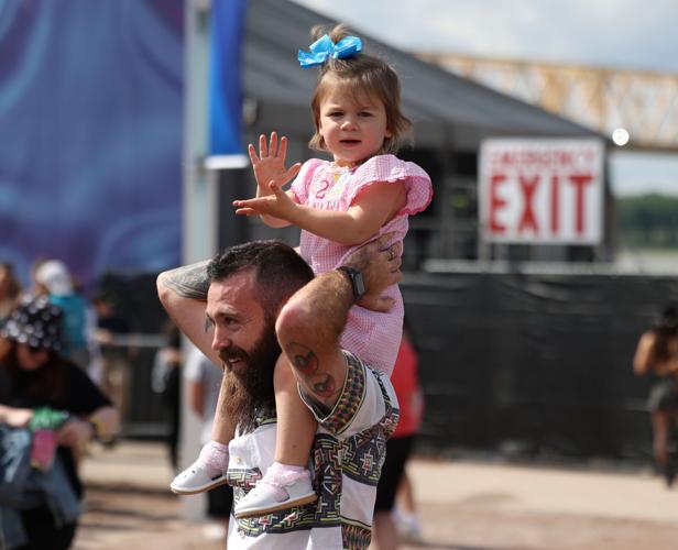 A child watches on a man shoulders at Forecastle.JPG