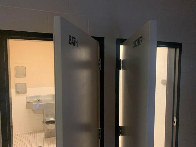 Louisville's Youth Detention Center communal shower and restroom