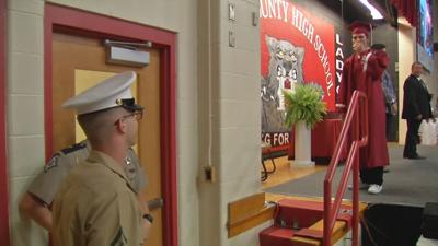 Henry County High School graduate gets emotional surprise from Marine brother