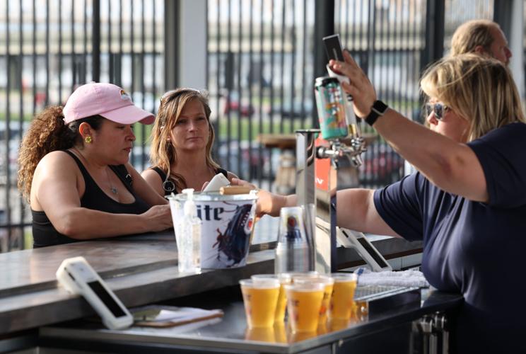 Fans get a beer at Bats game.JPG