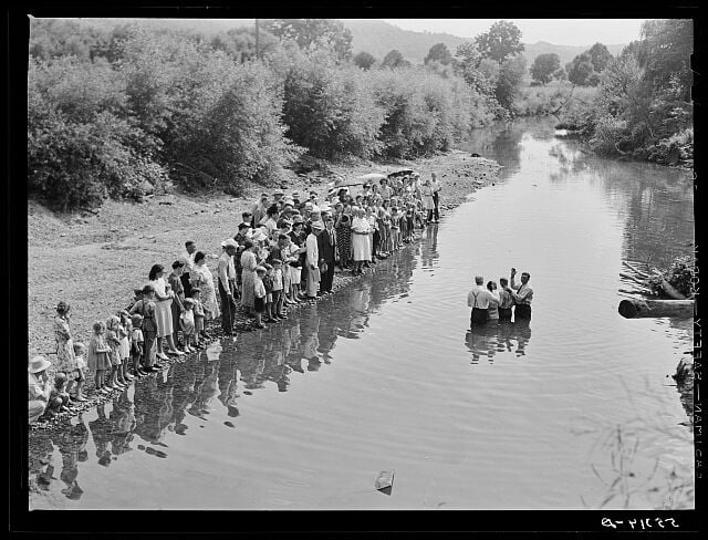 Members of the Primitive Baptist church attending a baptism by submersion. Marion Post Wolcott 1940.jpg