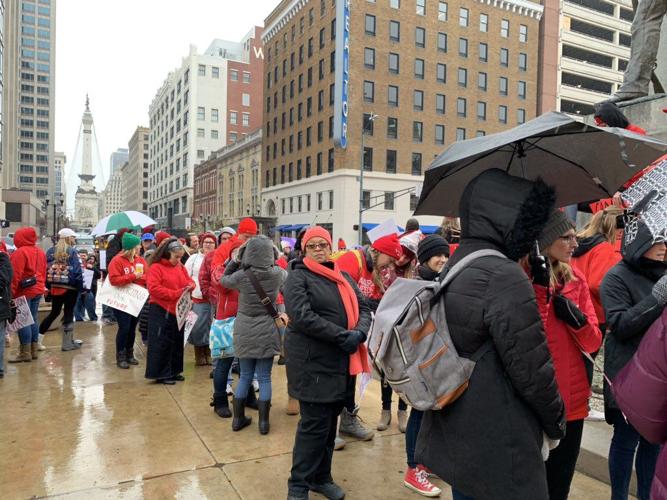 GO RED FOR ED - Teachers with Umbrellas.jpg