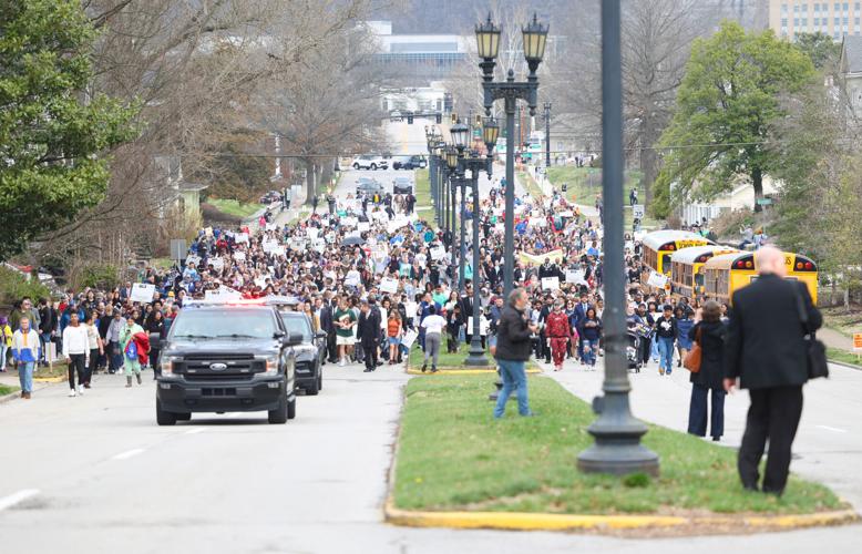 Crowd walks on Capital Avenue.JPG