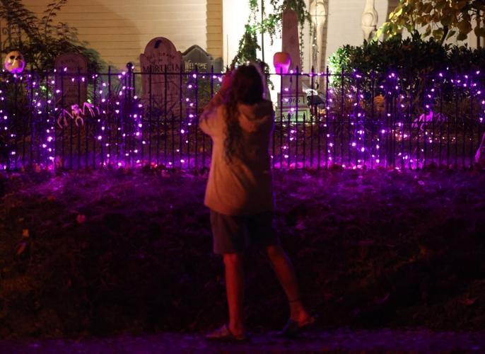 Person takes a photo of yard on Hillcrest.JPG