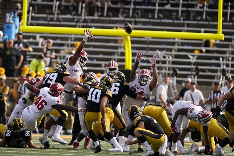 Iowa place kicker Caleb Shudak kicks a fied goal against Indiana.jpeg