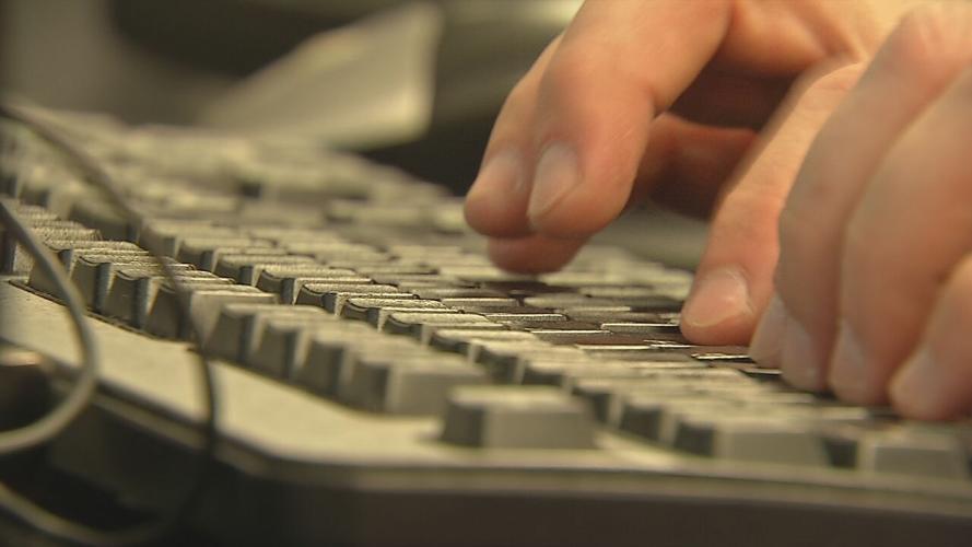 Person typing on computer generic.jpeg