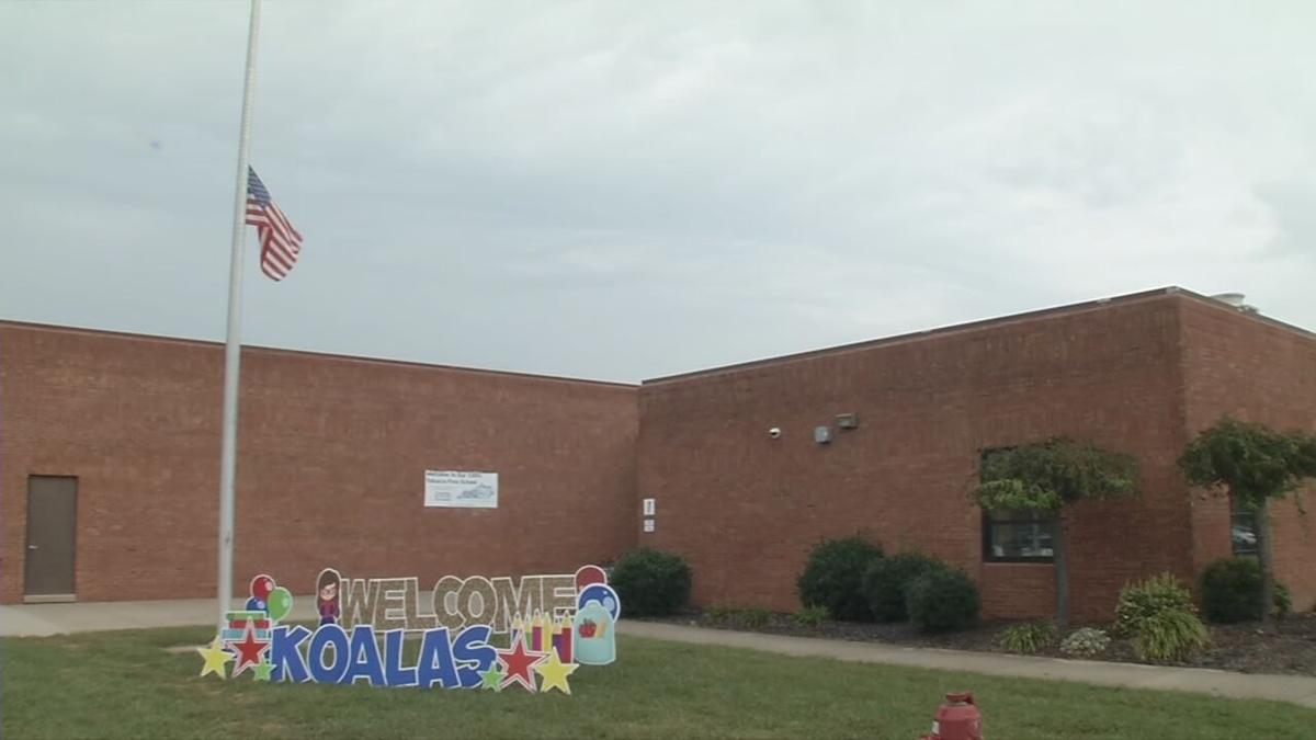 Old Mill Elementary with sign