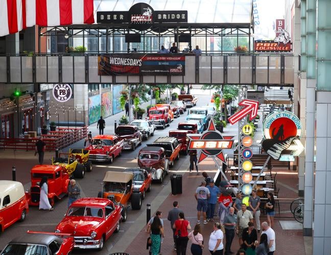 Street Rods parked at Fourth Street Live.JPG