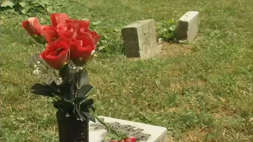 Greenwood cemetery gravestone flowers.jpg
