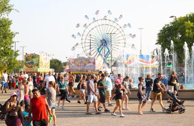 Crowd moves around Kentucky State Fair.JPG