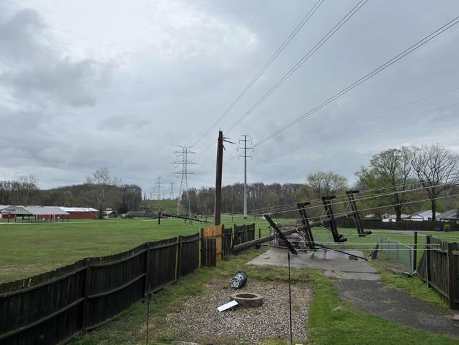Toppled utility pole on Green Valley Road in New Albany