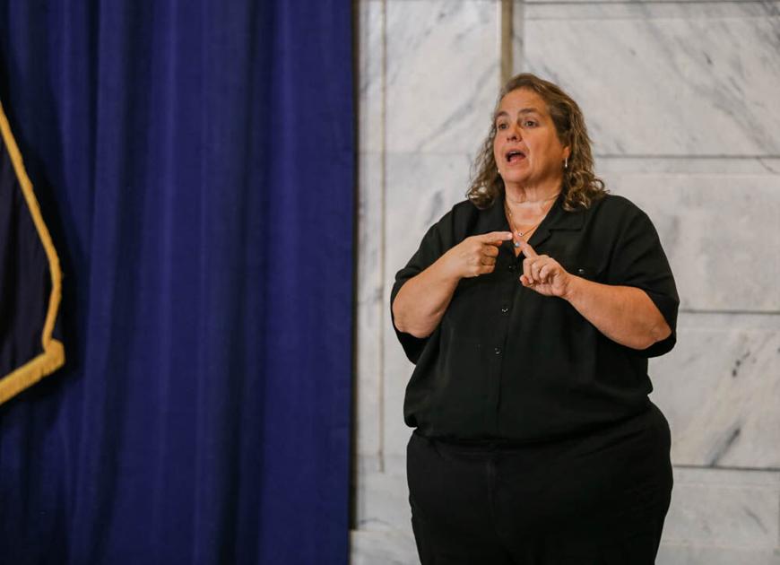 Sign interpreter Virginia Moore is cancerfree and returning to work with Gov. Beshear News