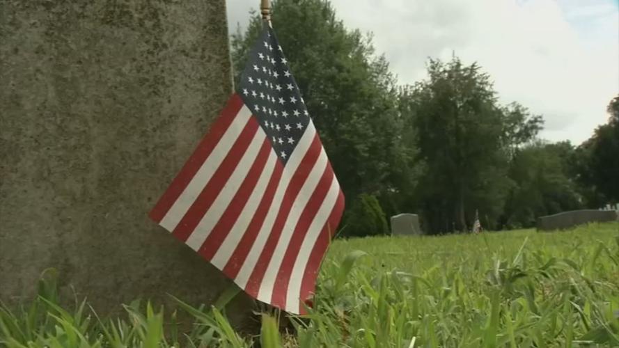 Greenwood cemetery gravestone and flag.jpg