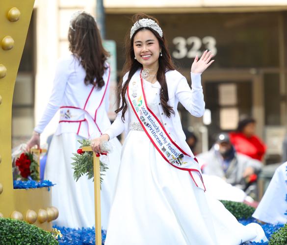 KDF princess waves to crowd at parade.JPG