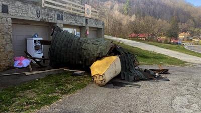 Debris covers the ground after part of the Mother Goose house collapsed on March 24, 2021 in Hazard, Ky