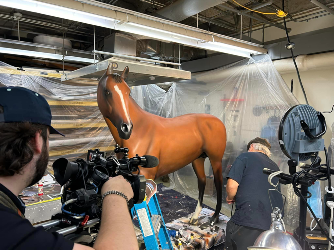 Mike Prather works on Winner's Circle display horse Mystik Can