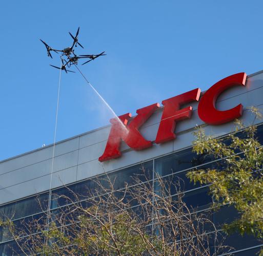 KFC pressure washed at Yum Center.JPG