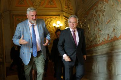 Eric Holcomb with Bernardo Ivo Cruz