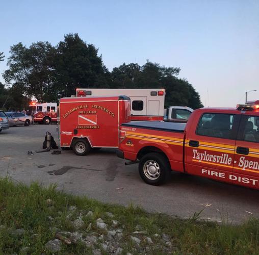 A rescue crew gathers at Taylorsville lake in Mt. Eden, Kentucky