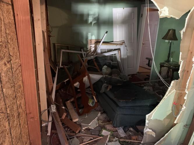 Living room damaged inside home