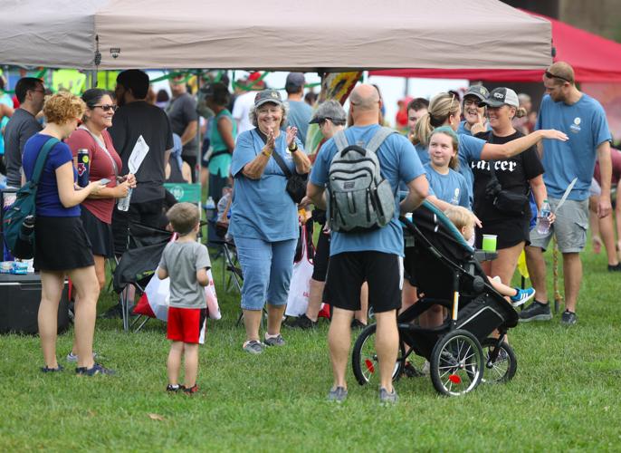 Woman claps at Race to Cure Sarcoma 2023.JPG