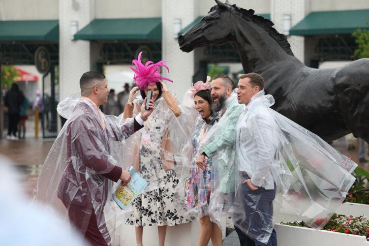 People take video at Churchill Downs.JPG