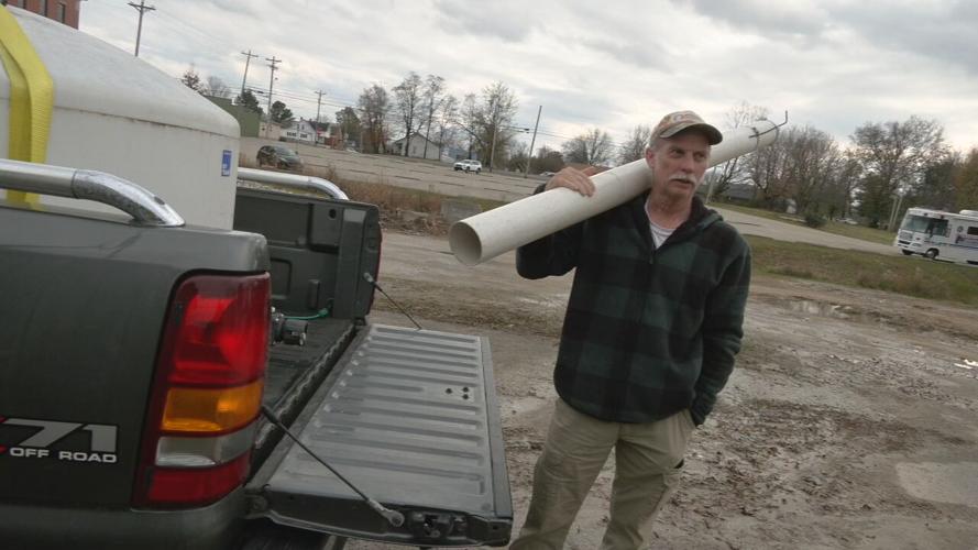 Breckinridge County neighbor waits to haul drinking water