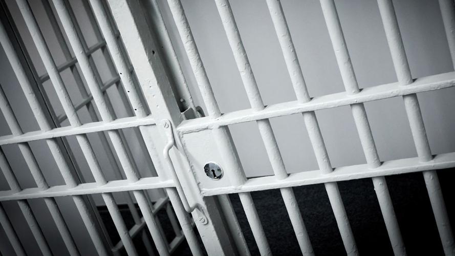wide_ jail bars prison cell - graphic (4).jpg