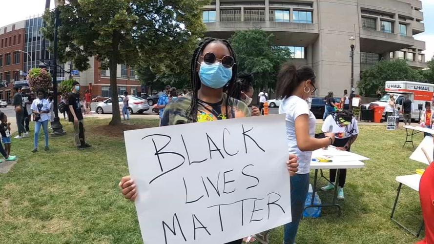 Protester holds sign on 6-19-20 in Jefferson Square Park
