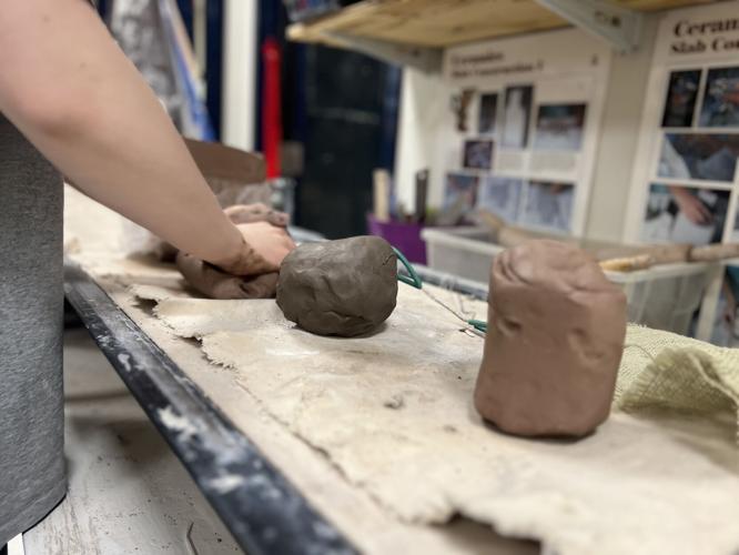A student at Providence High School in Clarksville molds clay